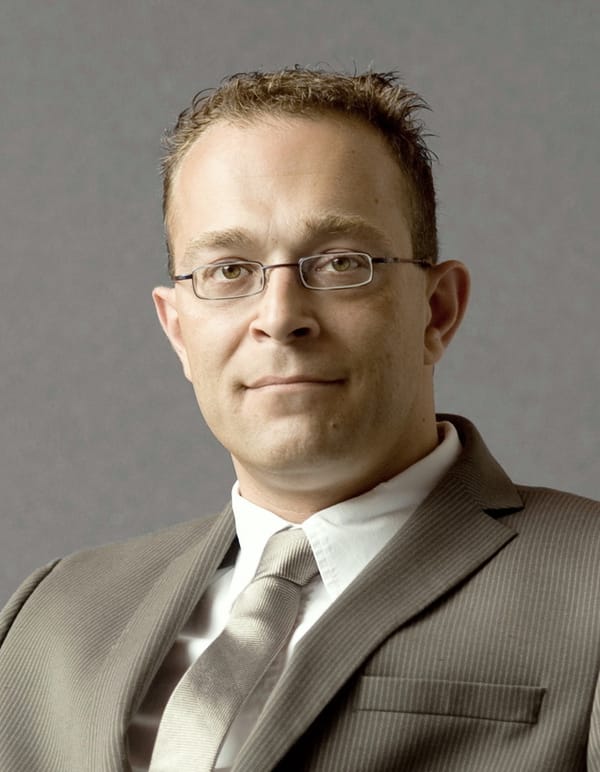 xaitment befördert Schneider